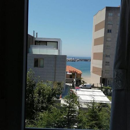 Apartamento planta alta en casa Sanxenxo Exterior foto