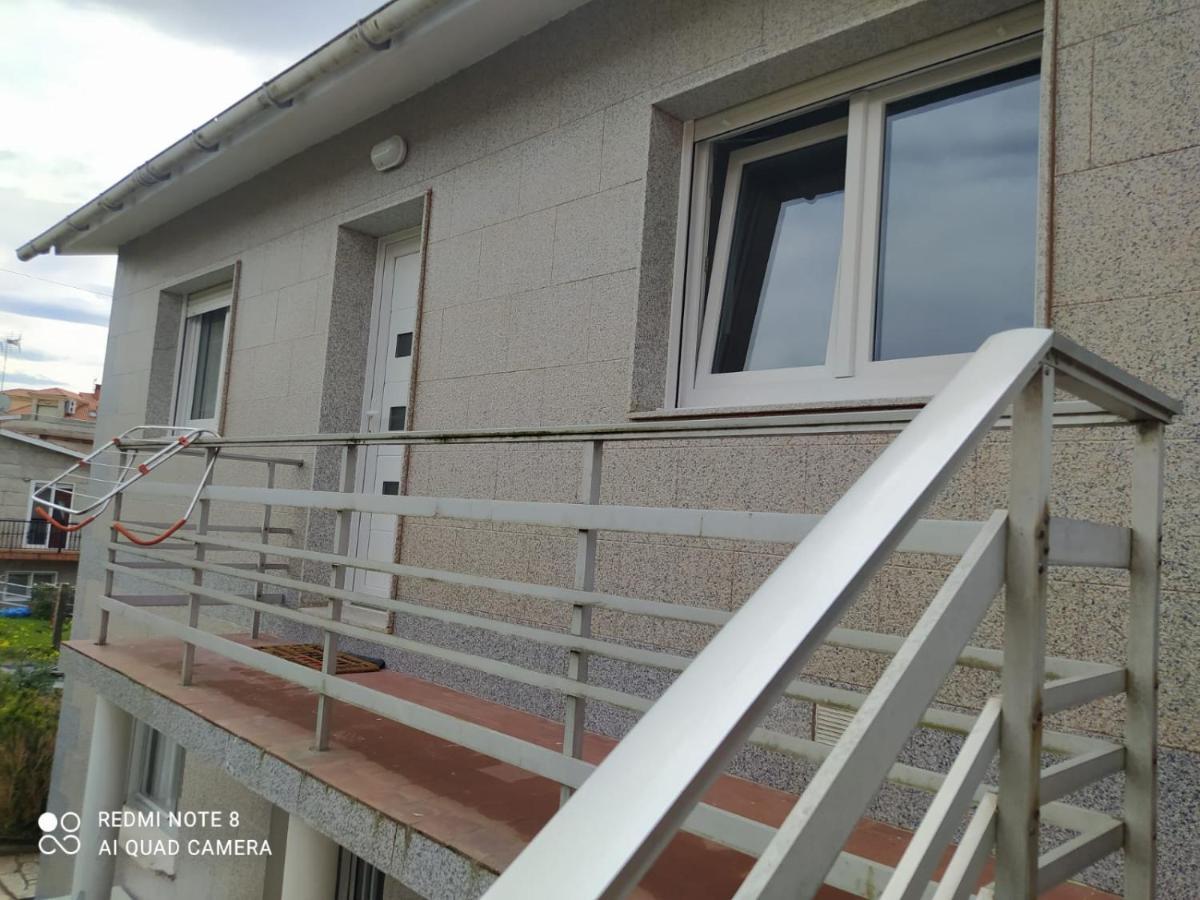 Apartamento planta alta en casa Sanxenxo Exterior foto