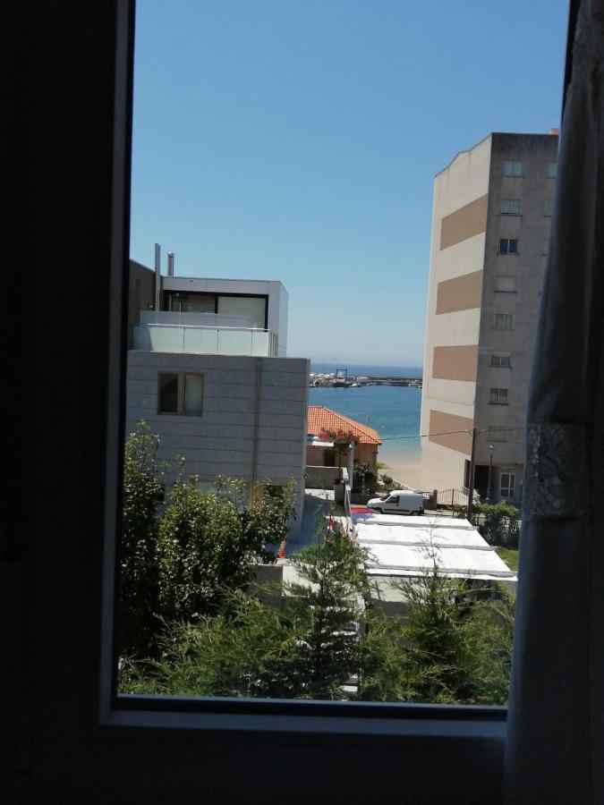 Apartamento planta alta en casa Sanxenxo Exterior foto