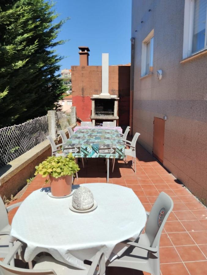 Apartamento planta alta en casa Sanxenxo Exterior foto